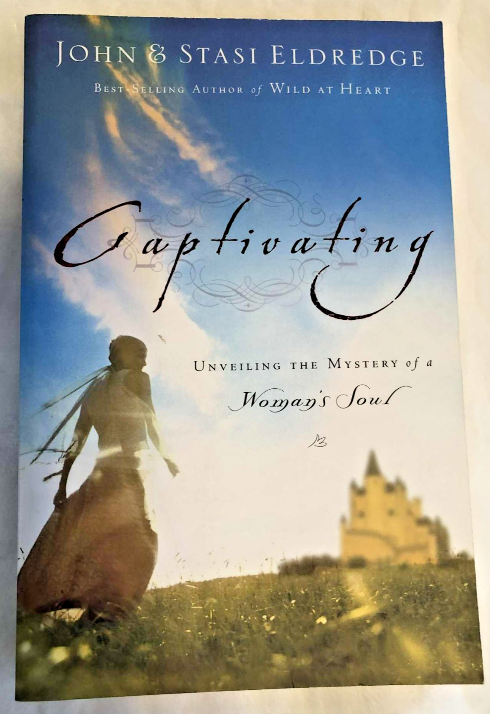 Captivating Revised & Updated: Unveiling the Mystery of a Woman's Soul Paperback