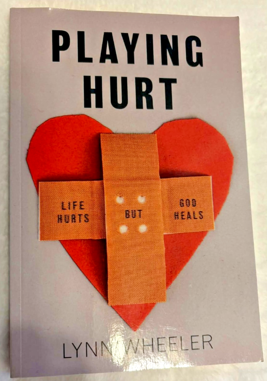 Playing Hurt: Life Hurts but God Heals -- Paperback -- Excellent  Condition